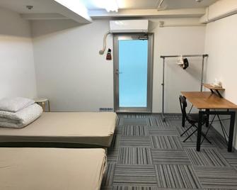 هوستل فورويا - أوساكا - غرفة نوم