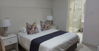 The Hampton Exclusive Guest House - East London - Schlafzimmer