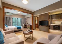 Poltton International Apartment (Foshan Zumiao Lingnan Tiandi Branch) - Foshan - Pokój dzienny