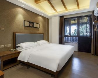 Cuigu Shangpin Hotel - Kunming - Bedroom