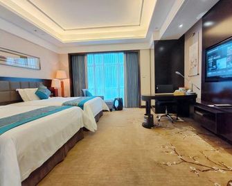 Howard Johnson by Wyndham Shipu Plaza Ningbo - Ningbo - Camera da letto