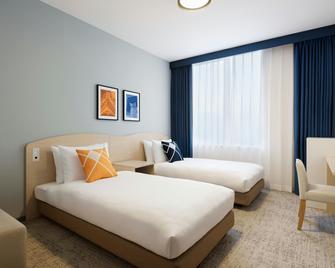 Four Points Flex by Sheraton Hakodate Station - Хакодате - Спальня