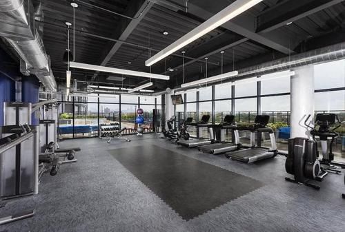 Gym view of DT Delight Downtown Living One-bedroom Endless Access