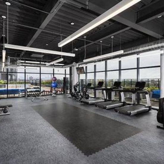 Gym view of DT Delight Downtown Living One-bedroom Endless Access