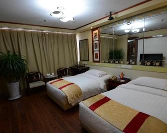 Yuquan Simpson Hotel - Jinan - Bedroom