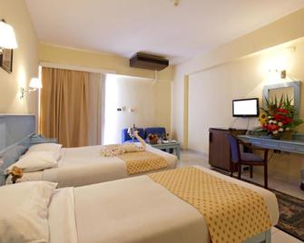 Empire Hotel Aqua Park - Hurghada - Schlafzimmer