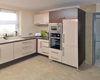 Pension Schlossidyll - ويرنيغرود - مطبخ