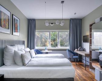 numa I Bona Rooms & Apartments - Bonn - Bedroom