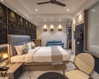 Hotel Supreme Inn - Thane - Schlafzimmer