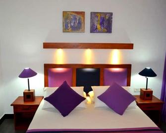 Star Beach Guest House - נגומבו - חדר שינה