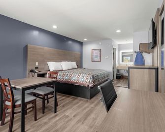 Express Inn & Suites Westwego - ווסטווגו - חדר שינה