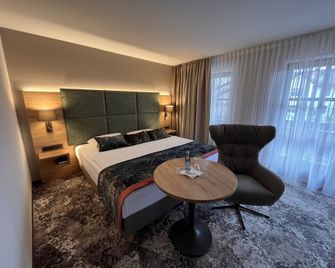 Appartment-Hotel-Hölzl - Grünwald - Schlafzimmer