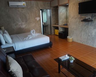 أه نايس ريزورت آند فيلا - بوريرام - غرفة نوم