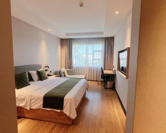Greentree Inn Shangrao Wuyuan Bus Station Tang Village Express Hotel - Shangrao - Bedroom