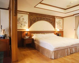 Kingdom Hotel - Hsinchu - Schlafzimmer