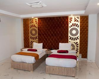 Nuva Hotel - Islamabad - Ložnice