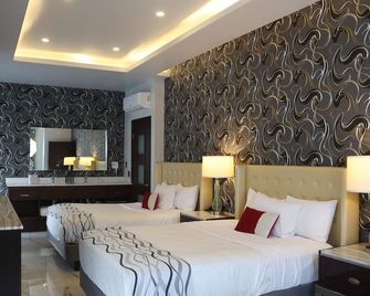 هوتل ويلينتاون - تيجوانا - غرفة نوم