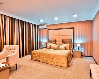 King Hotel Astana - Астана - Спальня
