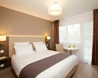 Séjours & Affaires Courbevoie Grande Arche - Courbevoie - Bedroom