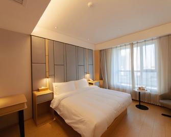 Ji Hotel Changchun Tongzhi Street Wanda Plaza - Changchun - Bedroom