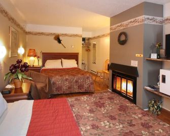 Motel Le Jolibourg - Saint-Sauveur - Bedroom