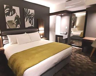 Copperwood Hotel and Conferencing - Brits - Bedroom