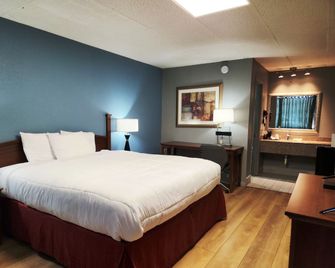 Executive Inn By OYO Queenville Mena - Mena - Slaapkamer