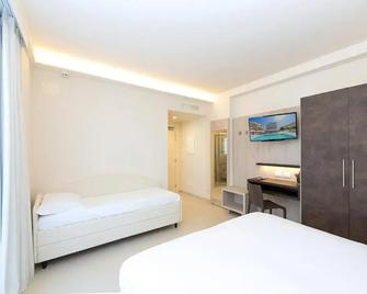 Hotel Carducci - Tortoreto - Slaapkamer