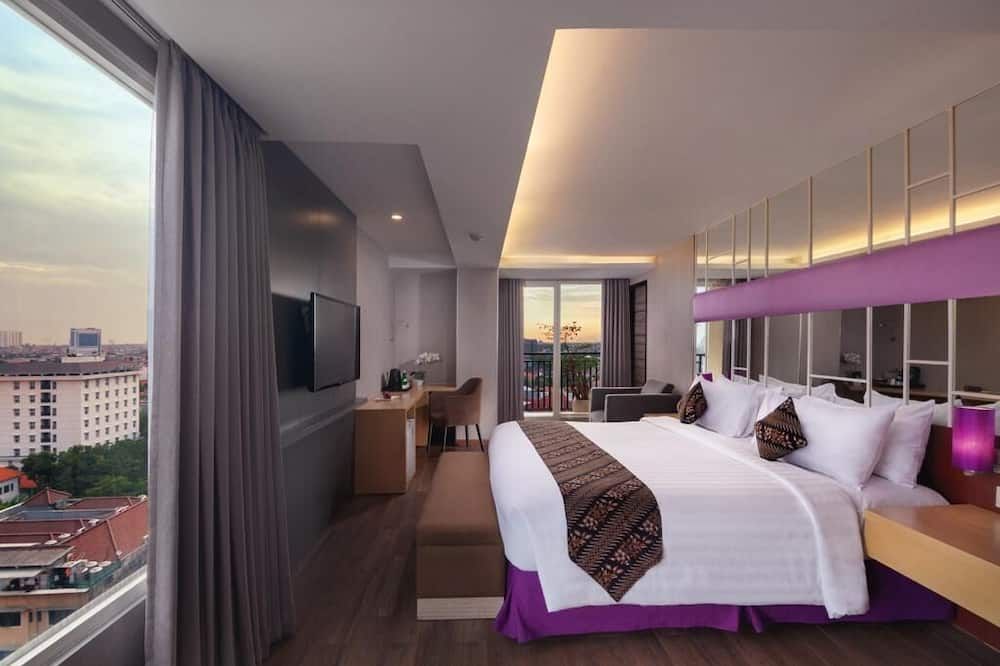 كويست هوتل دارمو - سورابايا باي أستون - سورابايا - غرفة نوم