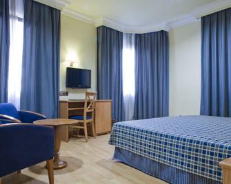 II Castillas Madrid - Madrid - Bedroom