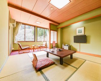 Hotel Izumiya - Shiroishi - Slaapkamer