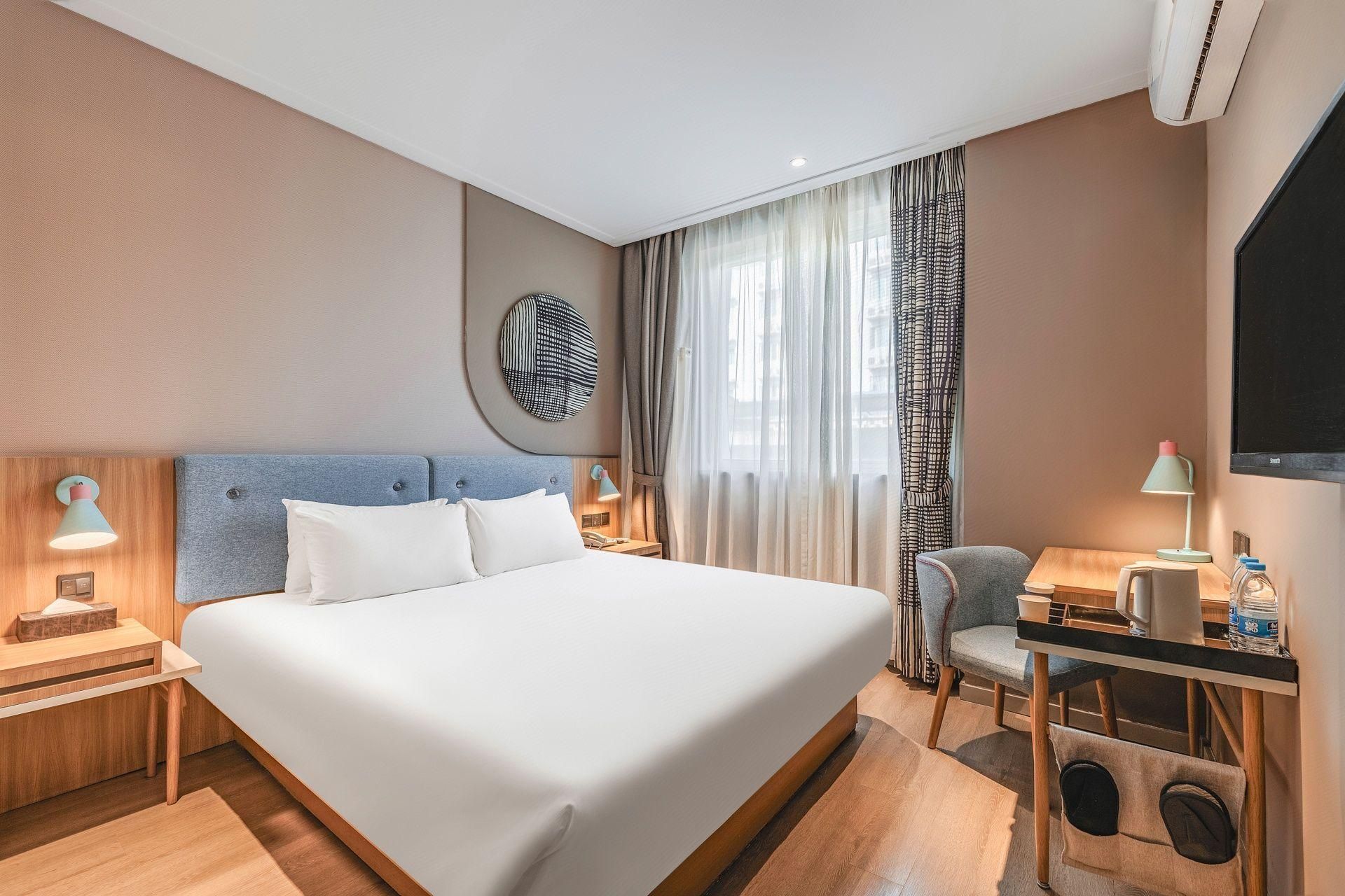 Home Inn Neo Xi'an Bell Tower Juhuayuan - زيان - غرفة نوم