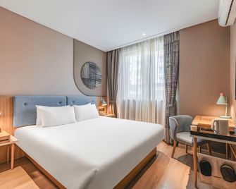 Home Inn Neo Xi'an Bell Tower Juhuayuan - زيان - غرفة نوم