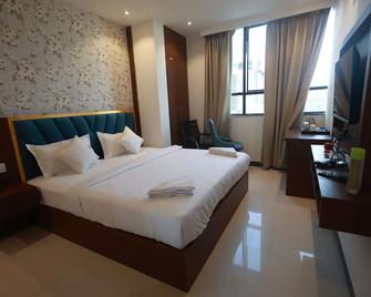 Hotel Tripka Square - Deoghar - Спальня