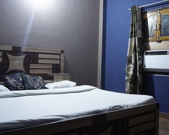Rudra Paying Guest House - Benarés - Habitación