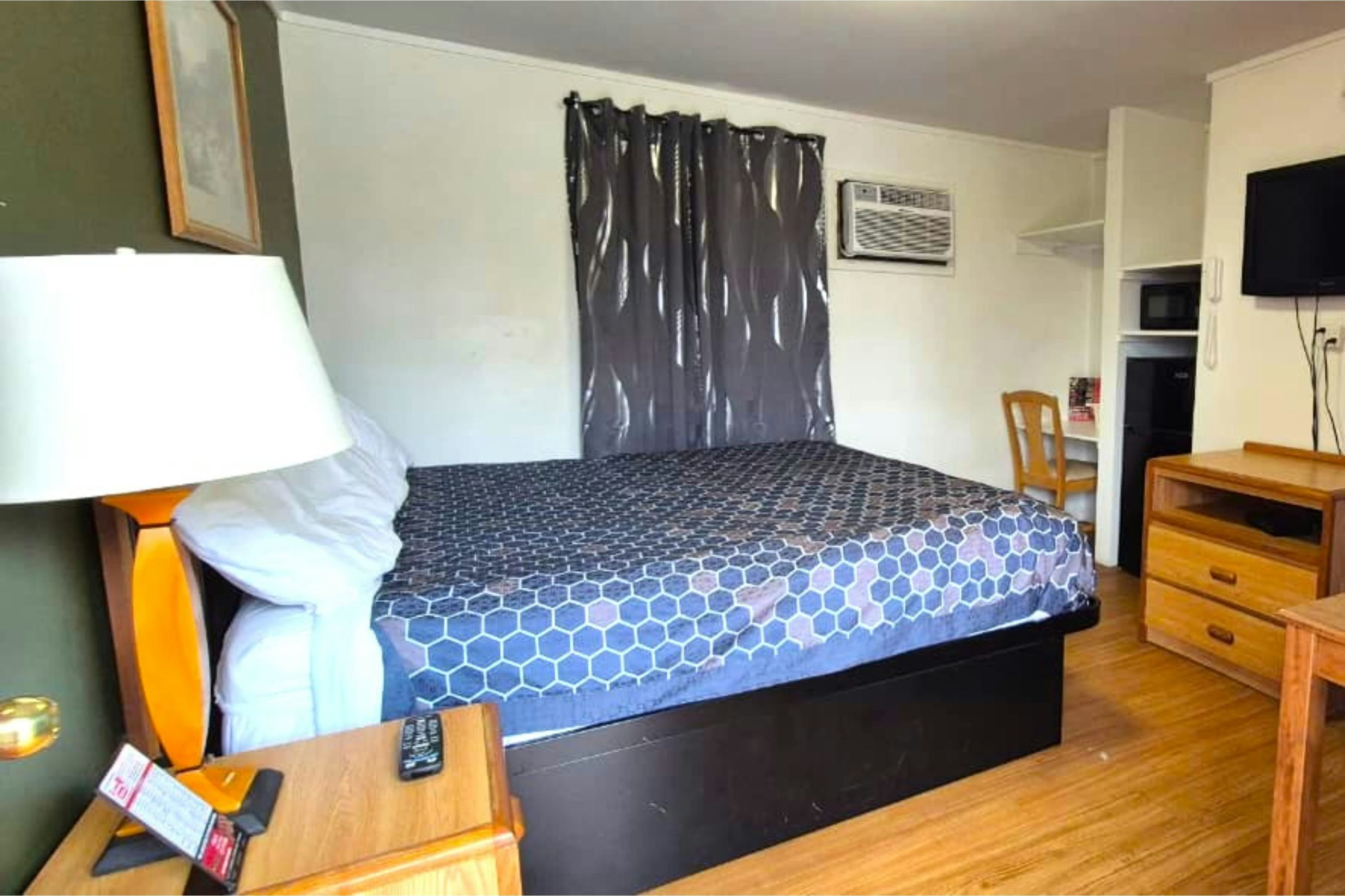 Economy Inn Cadillac MI by Hotel O - Cadillac - Schlafzimmer