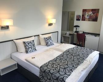 Parkhotel Neubrandenburg - Neubrandenburg - Slaapkamer