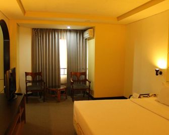 Benakutai Hotel and Apartemen - Balikpapan - Schlafzimmer
