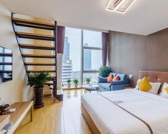 Qingdao Meitu Seaview Resort Apartment (Convention and Exhibition Center Shilaoren Bathing) - Qingdao - Bedroom