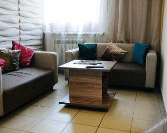 Matreshka Hotel - Irkutsk - Living room