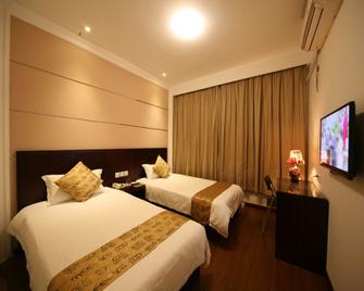 Baolong Homelike Hotel (Shanghai Railway Station Zhongshan North Road) - Shanghai - Bedroom