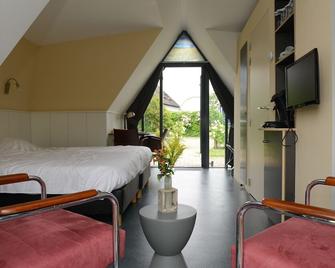 Hotelhuisje Warmenhuizen - Warmenhuizen - Habitación