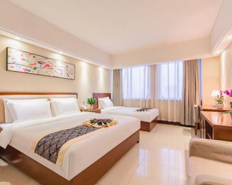 Sunta Grand Hotel - Luoyang - Bedroom