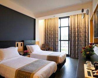 Cozzi Hotel - Si Rusa - Slaapkamer