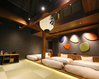 Hakuba Ryujin Onsen Ryokan Sui - Hakuba - Bedroom