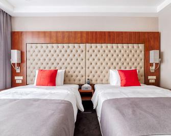 Ramada Plaza by Wyndham Voronezh City Centre - Voronezh - Habitación