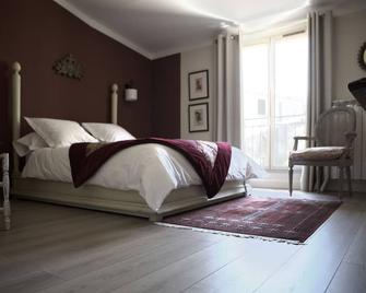 Les Jardins De La Livrée - וילנב לס-אביניו - חדר שינה