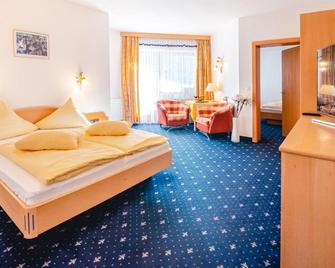 Hotel Alpinjuwel 3-Sterne Superior - גרלוס - חדר שינה