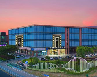 Maoshanwu Yiju Hotel (Changzhou Zhongwu Avenue Vientiane City) - Changzhou - Edificio