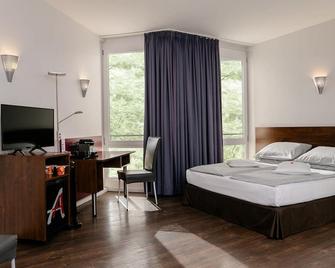 أوسزيت هوتل - داس فروستوكس هوتل - دوسيلدورف - غرفة نوم